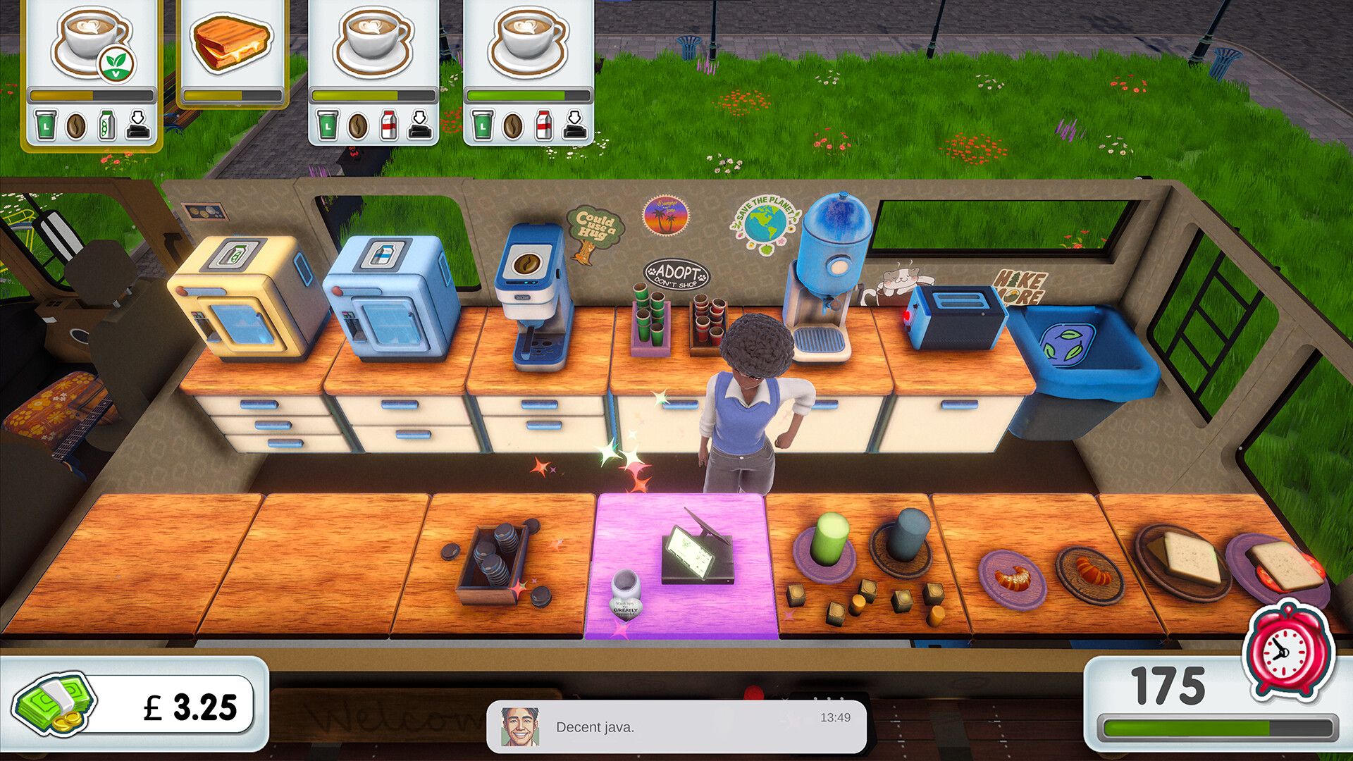 Jade working the counter of her camper van café, orders lined up above.